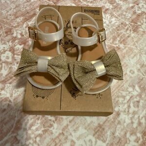 Mini Melissa Cream Sandals with Gold Glitter Bow